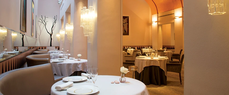 Round tables laid in white at Restaurant Patrick Guilbaud